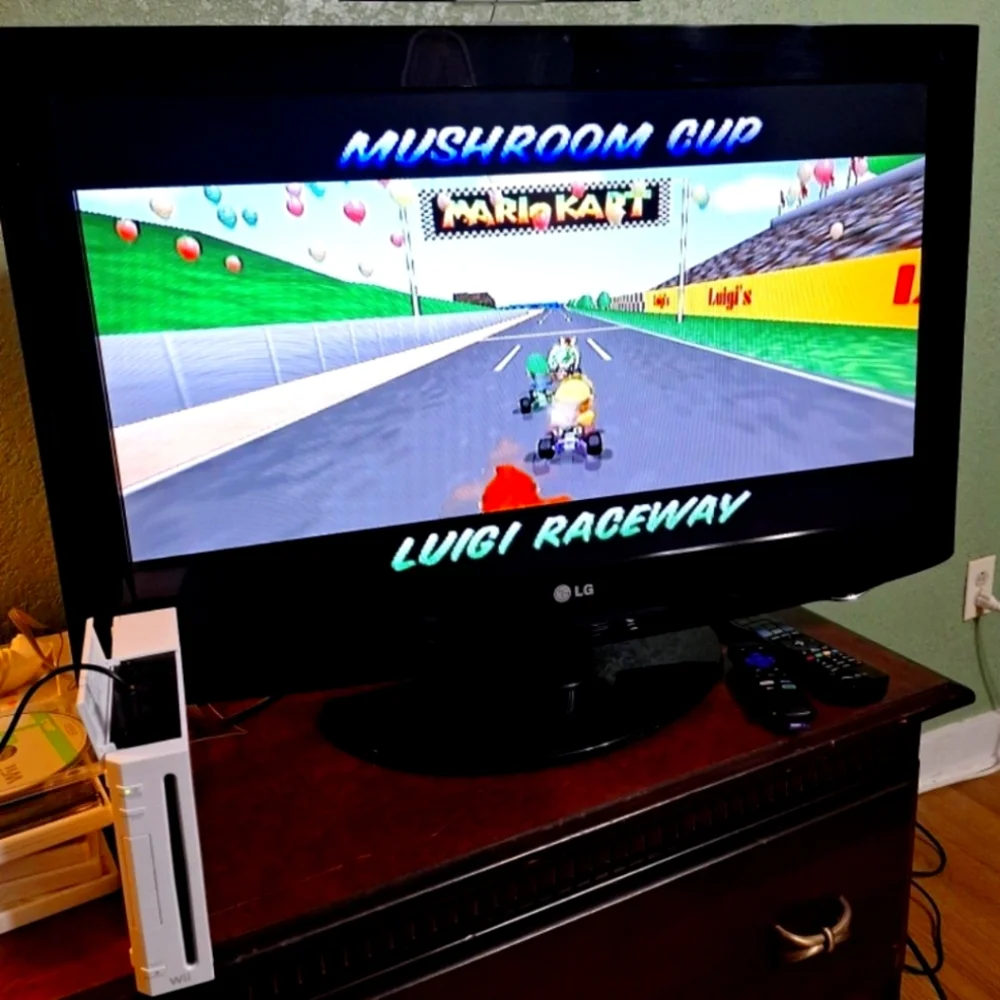Nintendo Wii Console with White Console and Black TV Display